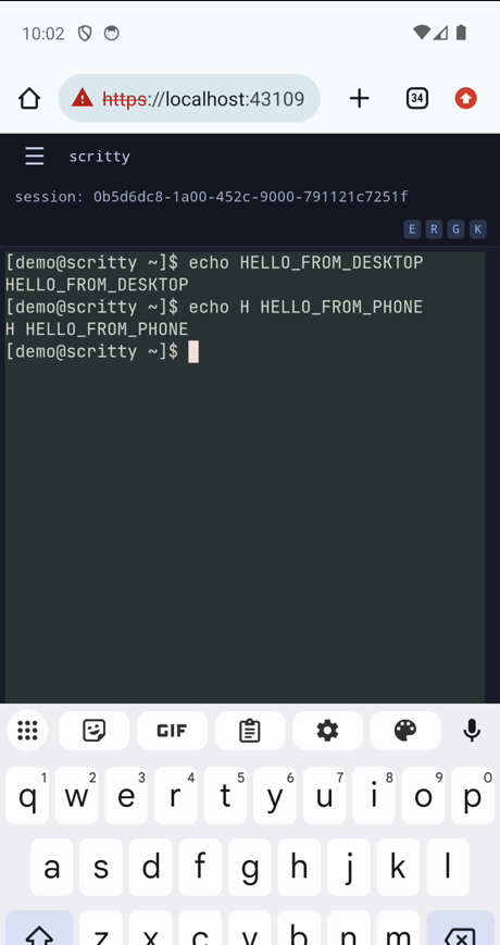 The same scritty session open in the mobile PWA, showing HELLO_FROM_DESKTOP and HELLO_FROM_PHONE with the on-screen keyboard